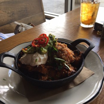 101 Craft Kitchen - Their version of enchilada layered and topped with all the traditional toppings. It's was GREAT - Gastropubs Near Me - Gahanna, Ohio