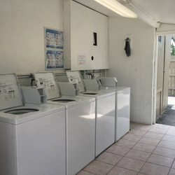 Lazy Lakes Campground - Laundry area, we have 4 washers , 6 dryers. And a table to fold your clothes on.