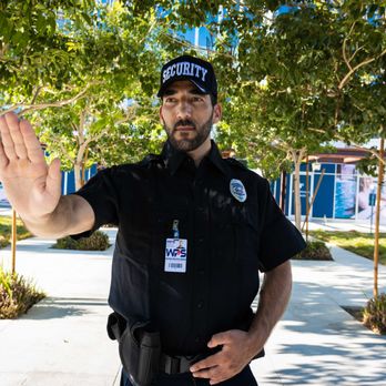 Wolfpack Protective Services - Wolfpack Protective Services guard on foot patrol. - Security Services Near Me - Reseda, California