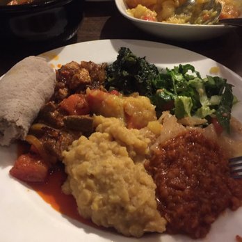 Keren Restaurant - A mixed plate of salad, spinach, lentils, cabbage, potatoes with carrots, meat and injera - Ethiopian Near Me - Washington, DC, District of Columbia Keren Restaurant - A mixed plate of salad, spinach, lentils, cabbage, potatoes with carrots, meat and injera - Ethiopian Near Me - Washington, DC, District of Columbia