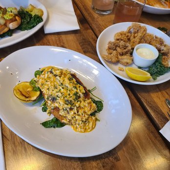 Peaches Prime - Clockwise from the right-pan seared salmon, fried calamari, lemon sole with crab, broiled chicken and potatoes. - Southern Near Me - Brooklyn, New York Peaches Prime - Clockwise from the right-pan seared salmon, fried calamari, lemon sole with crab, broiled chicken and potatoes. - Southern Near Me - Brooklyn, New York