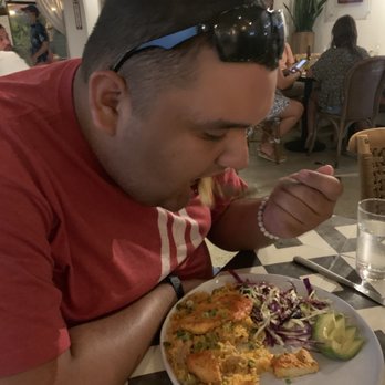 Ceviche's - Our son eating arroz com Pollo con Arroz - Seafood Near Me - Wilmington, North Carolina Ceviche's - Our son eating arroz com Pollo con Arroz - Seafood Near Me - Wilmington, North Carolina