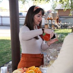 Cassandra’s Traveling Bar - Cassandra serving margaritas