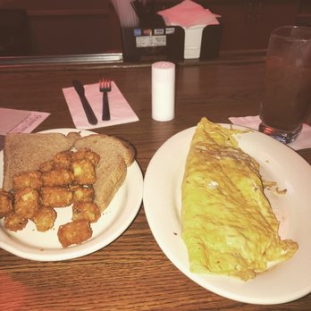 Cozy Lounge - an omelet and fried tater tots - Lounges Near Me - Columbus, Indiana