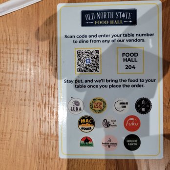 Old North State Food Hall - QR code to order and have brought to your table.  Nah, it still has defunct restaurants on it. - Food Court Near Me - Selma, North Carolina