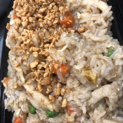 Happy Family Chinese Restaurant - Pineapple coconut fried rice  Topped with peanuts and fried onions