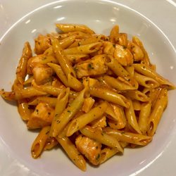 Penne with salmon in a creamy tomato sauce
