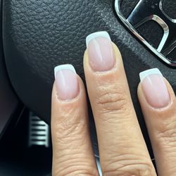 Asha Nail Spa - Index side file caused left side to curve ,  requested square French tips.