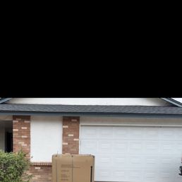 Outside front door/front of garage. Outside front door/front of garage.