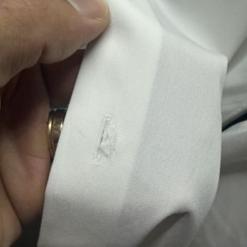 Vanity Cleaners - the fabric around several of the buttonholes was torn and damaged - Laundry Services Near Me - North Kingstown, Rhode Island Vanity Cleaners - the fabric around several of the buttonholes was torn and damaged - Laundry Services Near Me - North Kingstown, Rhode Island