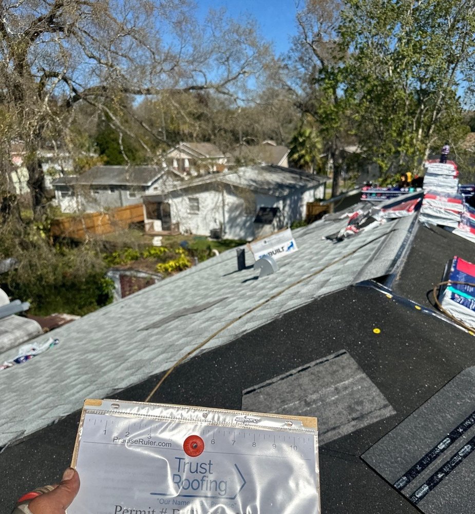 Slide of Trust Roofing