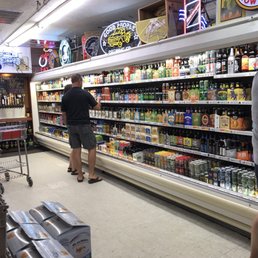 two men shopping in a grocery store