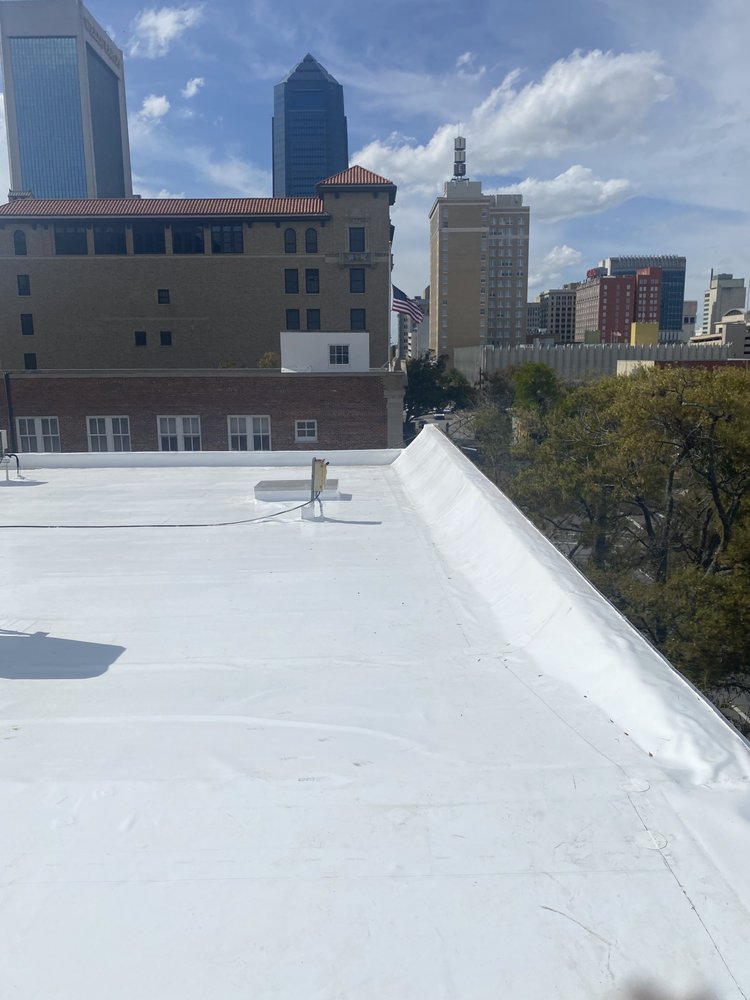 Slide of Ray’s Commercial Roofing Construction