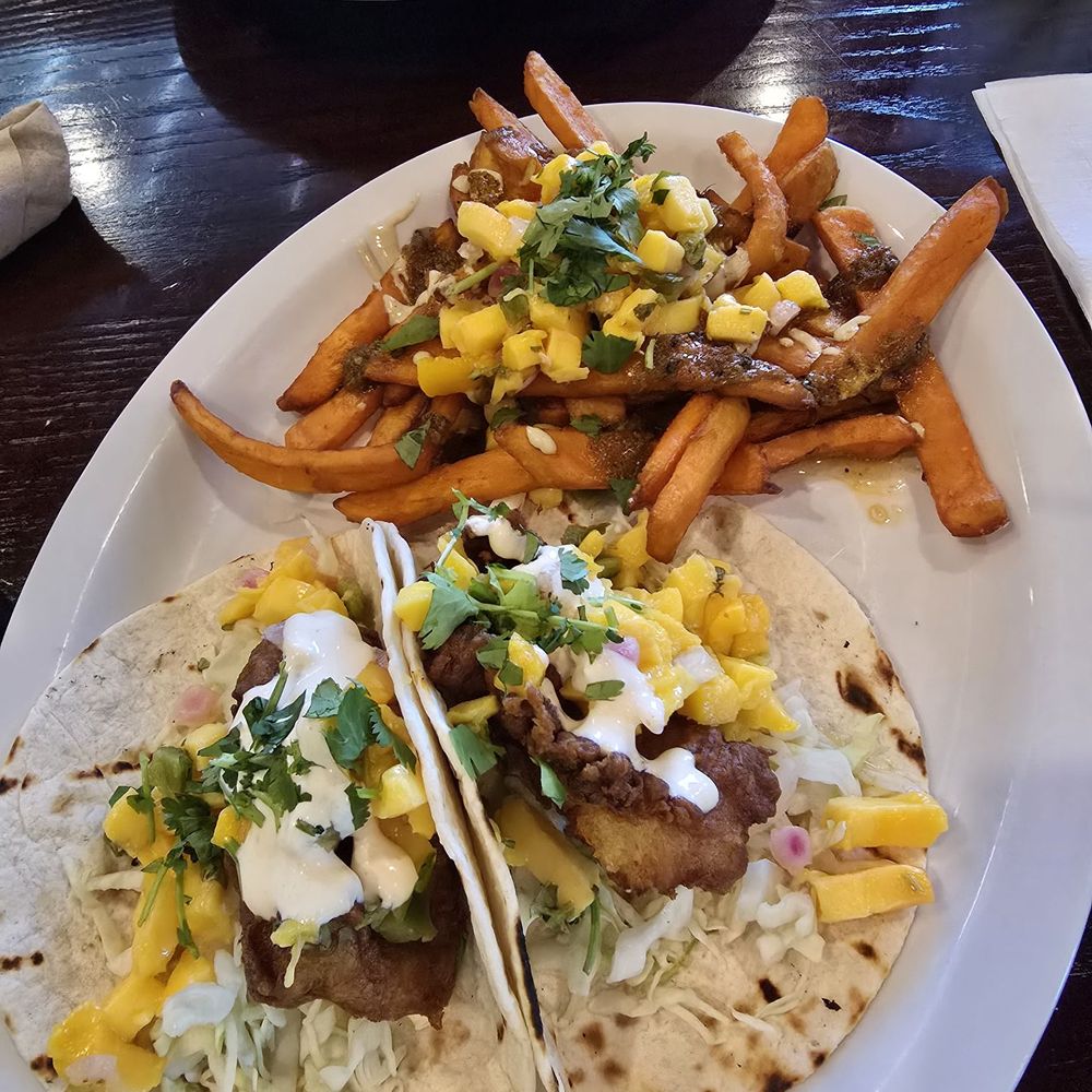 Fish tacos and Jamaican style sweet potato fries Fish tacos and Jamaican style sweet potato fries