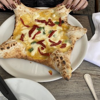 Bottega Italia - Special: yellow tomato sauce with sun dried tomatoes and stuff ricotta and basil crust. - Pizza Near Me - Temecula, California