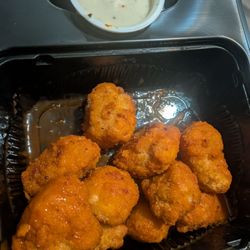 Papa Johns Pizza - Buffalo boneless wings. After I ate one of course. They were tasty.