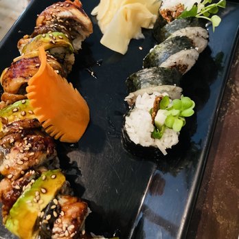 Sushi On Main Street - Dragon roll left and Salmon skin right - Sushi Bars Near Me - Half Moon Bay, California Sushi On Main Street - Dragon roll left and Salmon skin right - Sushi Bars Near Me - Half Moon Bay, California