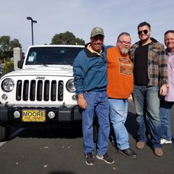 Moore Pre-Owned - Sam D ready to drive off in his new Wrangler, with his Dad and salesmen Kevin and John