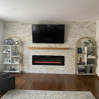 Nikola Z Construction - Build out of wall and installed electrical fireplace and brick wall. - General Contractors Near Me Nikola Z Construction - Build out of wall and installed electrical fireplace and brick wall. - General Contractors Near Me