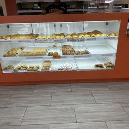 a display case full of donuts a display case full of donuts