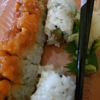 Mio Sushi Hawthorne - a close up of a plate of sushi with chopsticks - Sushi Bars Near Me - Portland, Oregon Mio Sushi Hawthorne - a close up of a plate of sushi with chopsticks - Sushi Bars Near Me - Portland, Oregon
