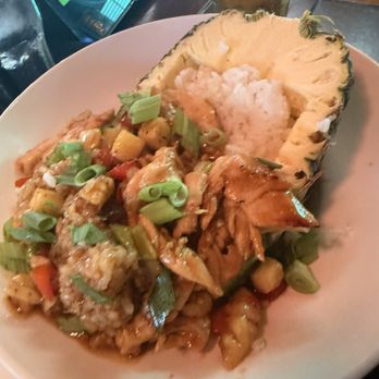 Bahama Breeze - Pineapple w rice and chicken husband said no complaints 10/10 - Bars Near Me - Orlando, Florida