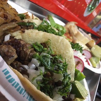 El Toro Tacos - Carne Asada taco in front... quesadilla in the background - Food Trucks Near Me - San Jose, California El Toro Tacos - Carne Asada taco in front... quesadilla in the background - Food Trucks Near Me - San Jose, California