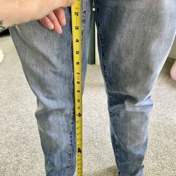 Santee Alteration and Cleaner - My son's measured 25" inseam. Note the tape measure ending at 28" which would leave him walking on his pants.