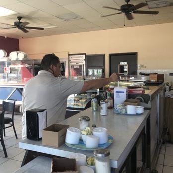 Vito's Bakery - a man preparing food in a restaurant - Bakeries Near Me - Miami Springs, Florida Vito's Bakery - a man preparing food in a restaurant - Bakeries Near Me - Miami Springs, Florida