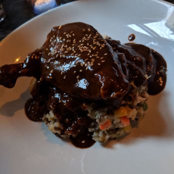 La Contenta Oeste - Pollo en Mole Poblano. Great Risotto, excellent mole. Platanos were alright - Mexican Near Me - New York, New York