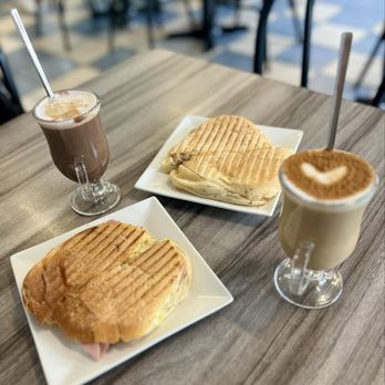 Europa Pastries Coffee Shop - Ham, Egg, St Jorge Cheese Breakfast Sandwich on Artisan Bread, grilled, Galão & Mocha Latte - Coffee & Tea Near Me - Fall River, Massachusetts