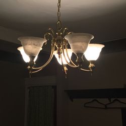 The Catskills B and B - Bulbs missing in the only source of light in the room. I guess if you keep it dark, no one sees the filth.