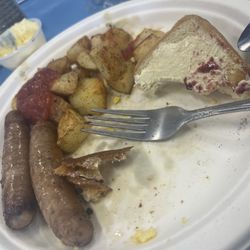 Blue Ox Cafe - Uncooked potatoes, awful tasting sausage just ate my tiny paper thing bacon and the bread