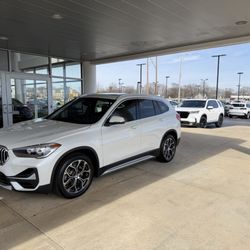 Newbold BMW - The X1 and my trade-in in the background of the pilot