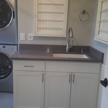 M2 Construction NW - a washer and dryer in a laundry room - General Contractors Near Me M2 Construction NW - a washer and dryer in a laundry room - General Contractors Near Me