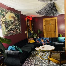 a living room with a couch and a table