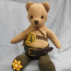 Curtis Blue Line - Turn your old uniforms into a one of a kind heirloom your family will cherish. Each custom bear comes with their own birth certificate !