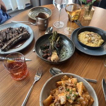 Luminosa - Spicy rigatoni, steak, green onion and polenta sides. - Italian Near Me - Asheville, North Carolina