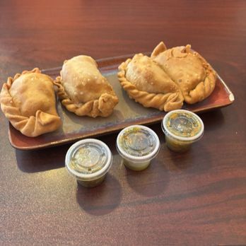 Division Cafe - 4 empanadas. I ate 2 and took the other 2 home. Perfect texture, flavor. I'm hooked. - Latin American Near Me - Somerville, New Jersey