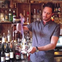 The buttery,  fiery rum drink is "A Night at the Cinemas."  Tastes like...  Popcorn!