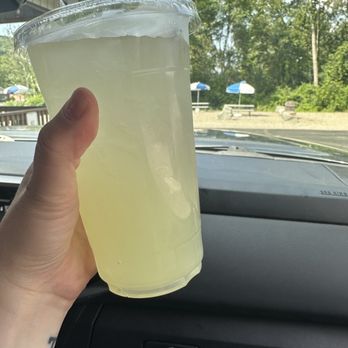 Keuka Creamery - a person holding a drink in a car - Ice Cream & Frozen Yogurt Near Me - Hammondsport, New York Keuka Creamery - a person holding a drink in a car - Ice Cream & Frozen Yogurt Near Me - Hammondsport, New York