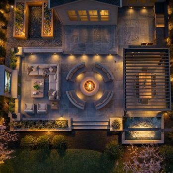 Allscape Patio & Landscape - Drone footage of a stamped concrete outdoor living space with a motorized pergola, outdoor kitchen, and entertainment center. - Landscaping Near Me Allscape Patio & Landscape - Drone footage of a stamped concrete outdoor living space with a motorized pergola, outdoor kitchen, and entertainment center. - Landscaping Near Me