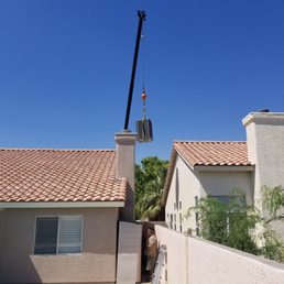Crain removing and placing new unit.