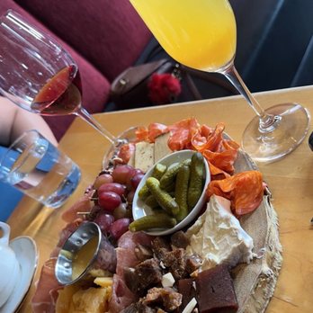 Camp 4  - Small Cheese & Charcuterie Board with fresh squeezed orange juice mimosa & I believe a sweet red - Wine Bars Near Me - Modesto, California