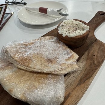 Sahara Bistro - Complimentary pita and garlic dip - Mediterranean Near Me - Grand Rapids, Michigan Sahara Bistro - Complimentary pita and garlic dip - Mediterranean Near Me - Grand Rapids, Michigan