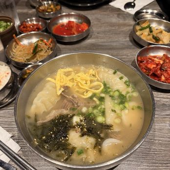 Woomiok - Bone Broth Dumpling Soup with Rice Cake - Korean Near Me - San Diego, California Woomiok - Bone Broth Dumpling Soup with Rice Cake - Korean Near Me - San Diego, California