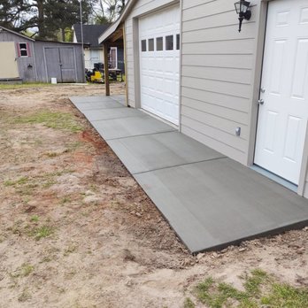 LG Dirtbusters - a man walking in front of a garage - Masonry/Concrete Near Me - Sumter, South Carolina LG Dirtbusters - a man walking in front of a garage - Masonry/Concrete Near Me - Sumter, South Carolina