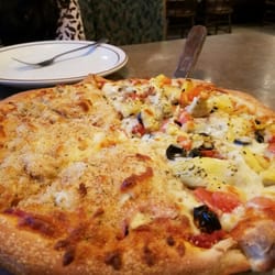 Ferino's Pizzeria - Great pizza and they allowed us to do a half and half for no extra charge. We got the chicken cordon bleu and one of the veggie options.