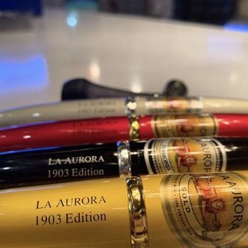 PuroBar Lounge - a row of bottles of wine - Cigar Bars Near Me - Miami, Florida PuroBar Lounge - a row of bottles of wine - Cigar Bars Near Me - Miami, Florida