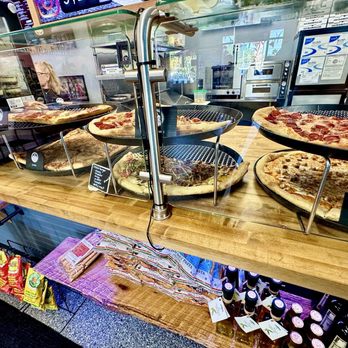 Pizza a Modo Mio - pizza is sold by the slice or one can order whole pizzas - Pizza Near Me - Charleston, South Carolina